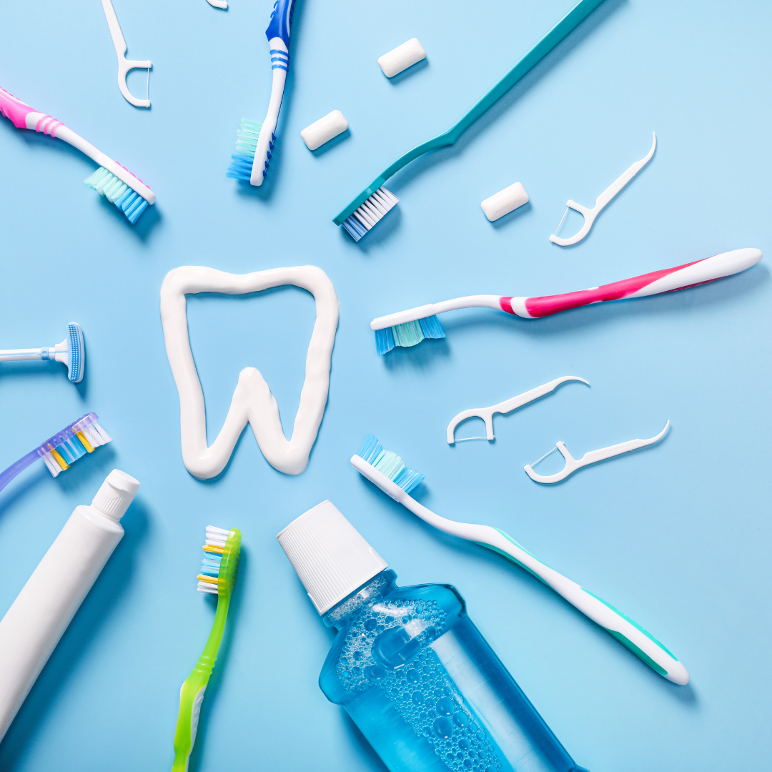 toothbrush and toothpaste on a blue background